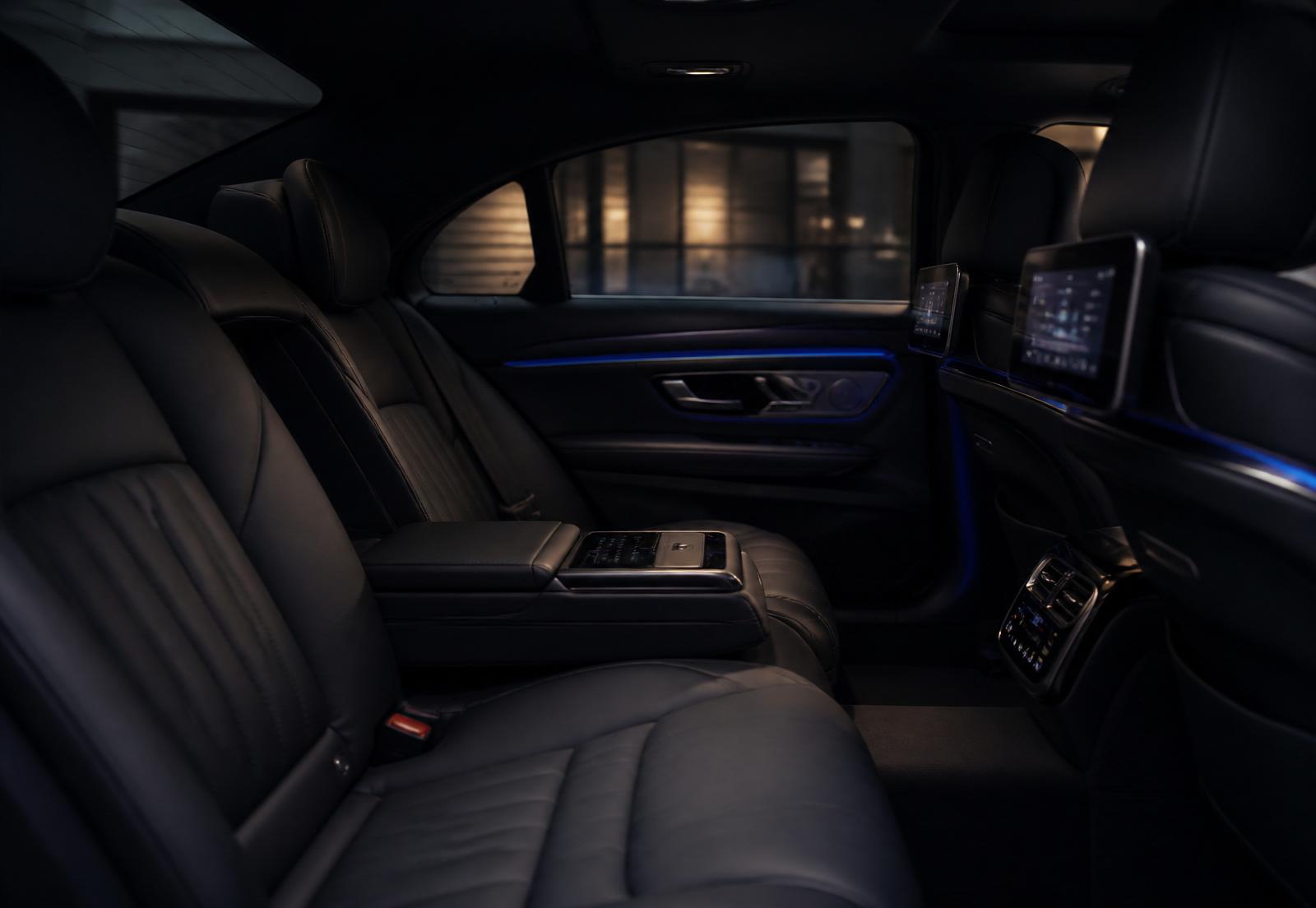Interior of a clean executive sedan with ambient sapphire lighting